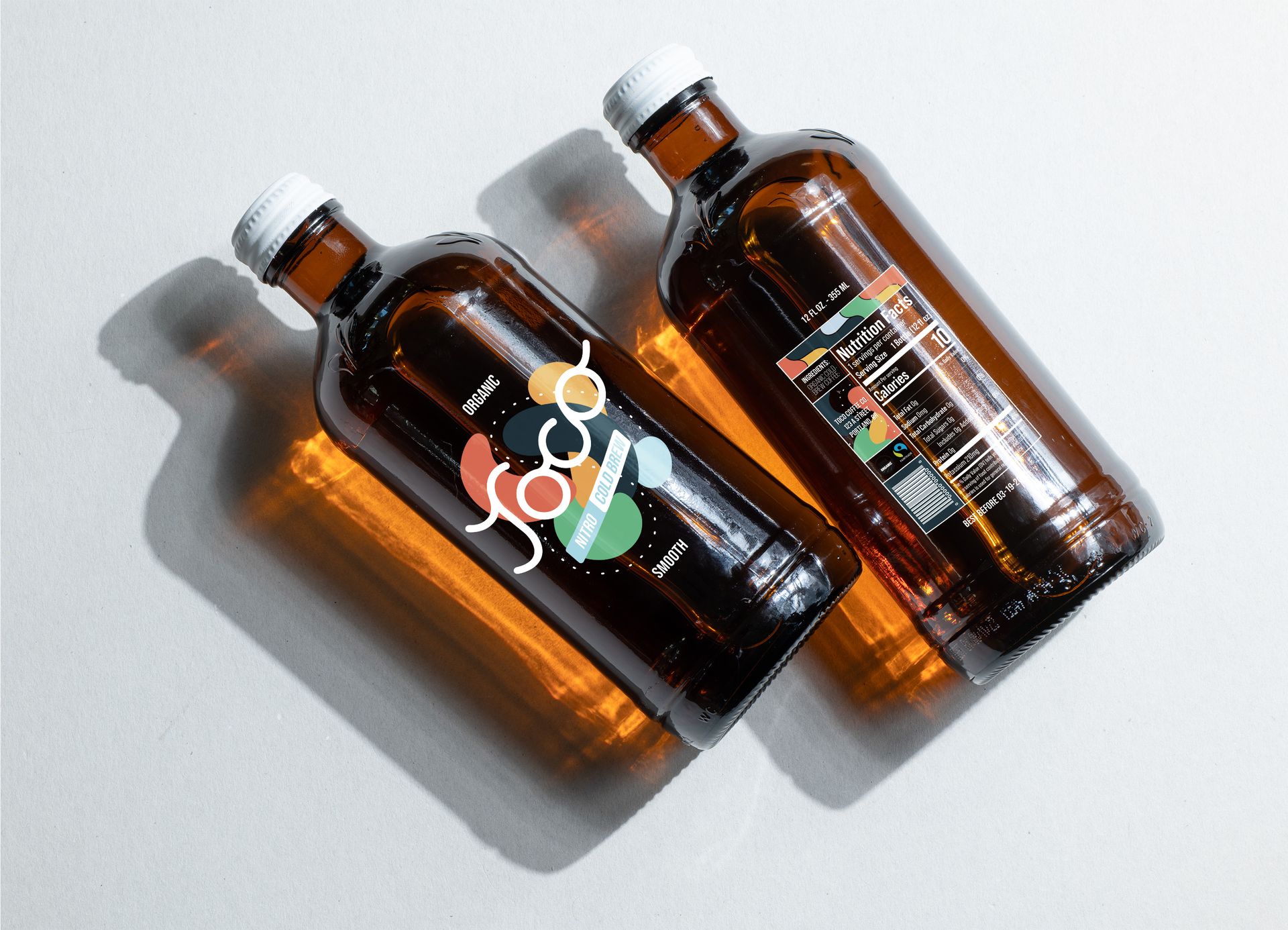 Amber glass bottles with a mock-up beverage graphic applied